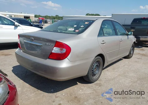 2002 Toyota Camry Le z USA, uszkodzony, nr VIN 4T1BE32K42U512328